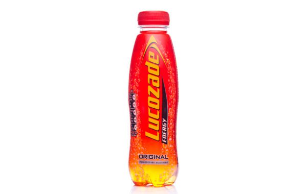 A bottle of lucozade drink on white background