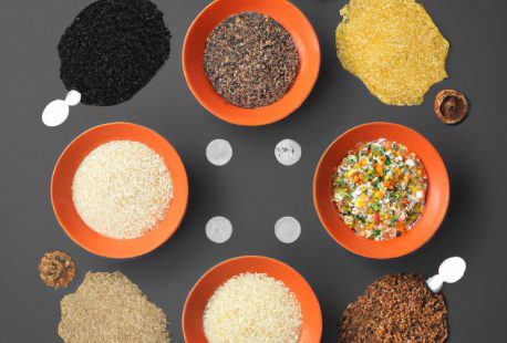 A table with bowls of different types of rice.